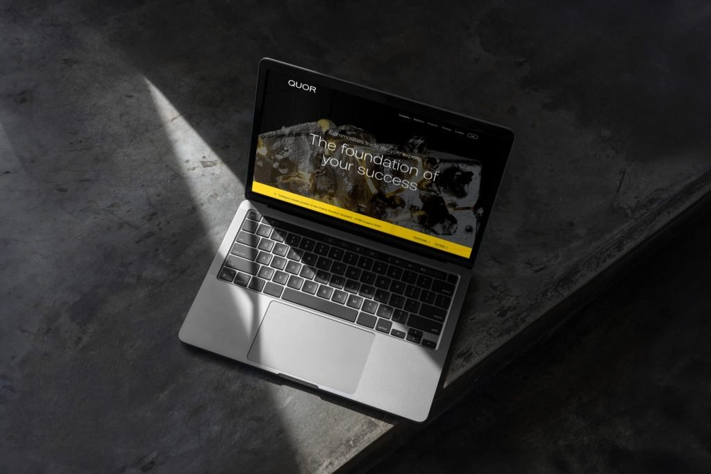 Quor visual identity on laptop